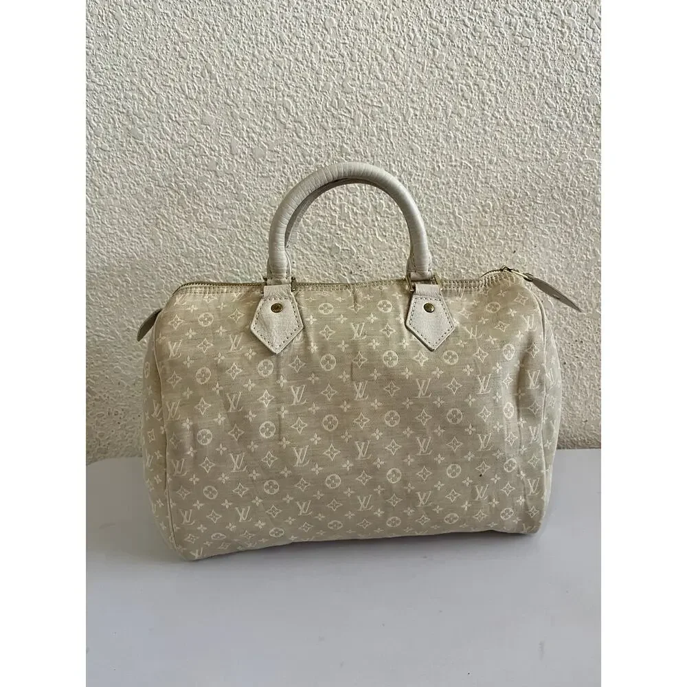 Louis Vuitton off white monogram cloth speedy 30